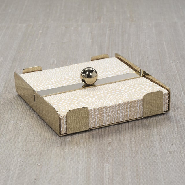 The Basso Napkin Holder combines sleek design with practical functionality. Crafted from steel in a polished finish, it...