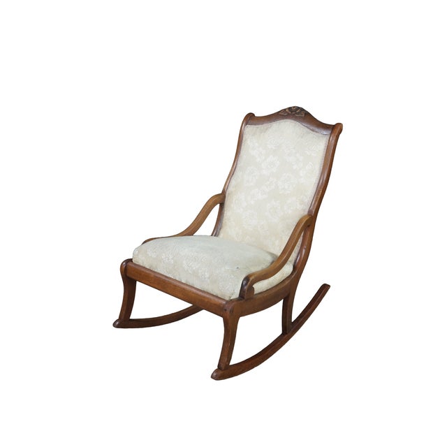 Handsome antique Victorian Lincoln rocker, Beautifully crafted from rich, solid walnut, exhibiting a warm grain pattern...