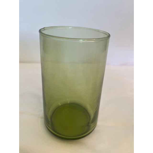 Bring timeless Mid-Century Modern style to your table with this beautiful 24-piece vintage olive green glass tumbler set,...