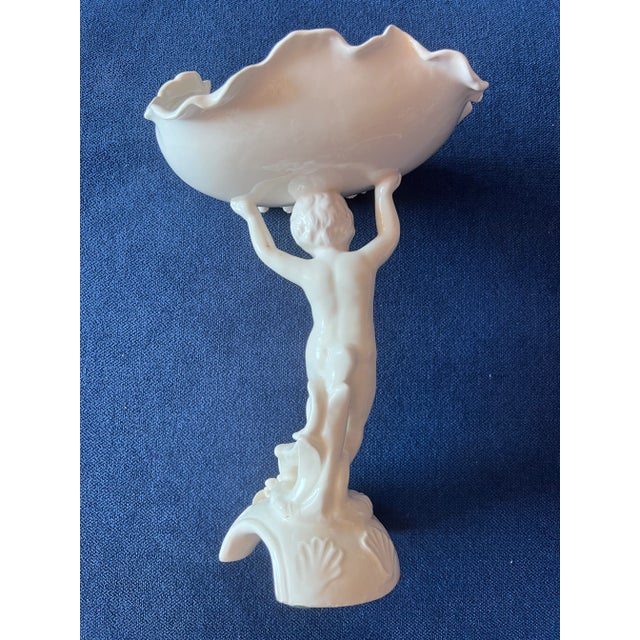 This very detailed and dainty cherub holding a bowl was made in Japan in the 1950's. It makes the perfect bathroom...