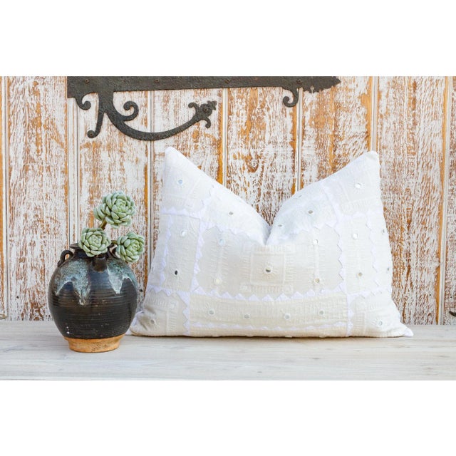 Cotton pillow with intricate appliqué, hand-done embroidery and beautiful mirror work by women of the Rabari tribe in...