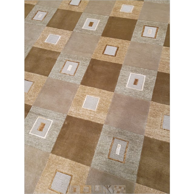 Modern geometric checkerboard-patterned hand-knotted rug featuring alternating textured interlocking square blocks in...