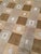 Modern geometric checkerboard-patterned hand-knotted rug featuring alternating textured interlocking square blocks in...