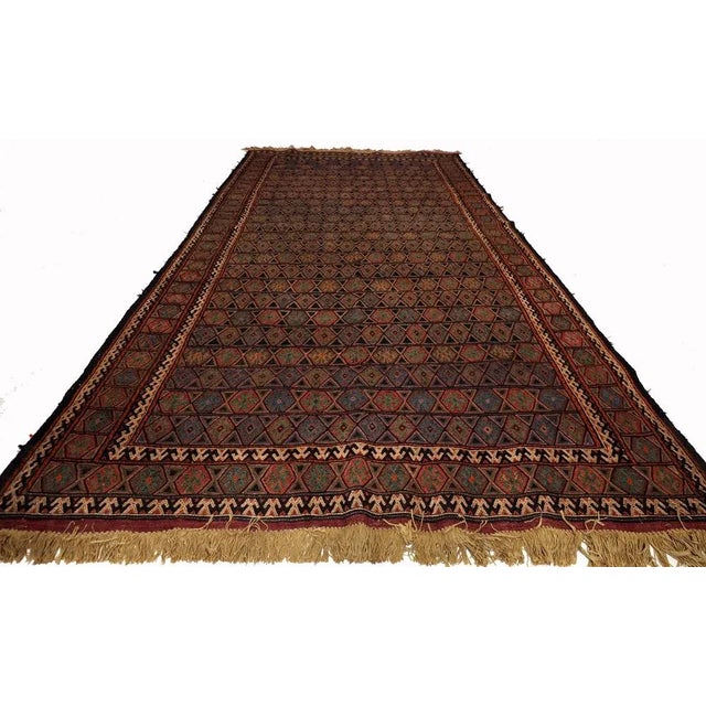 Enhance your home decor with a one-of-a-kind authentic kilim rug. Handwoven by skilled artisans, this stunning range of...