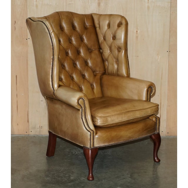 English Pair of Vintage Tan Brown Leather Chesterfield Wingback Chairs With Footstools For Sale - Image 3 of 18