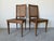 Elegant antique Italian Louis XVI–style accent chairs featuring beautifully carved wood frames and classic handwoven cane...