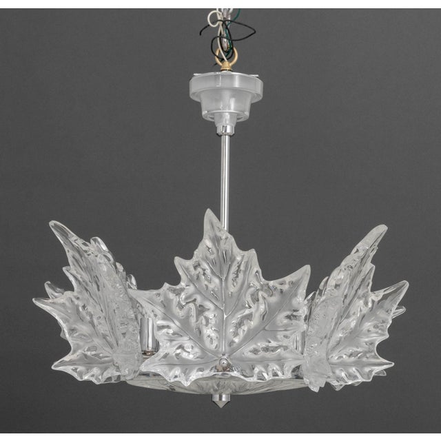 Lalique Champs-Elysees Chandelier, six-lights with molded clear and frosted leaf motif on chrome-plated hexagonal frame,...