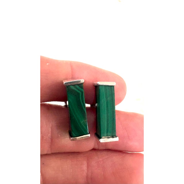 Sterling silver and green malachite oblong cufflinks, featuring natural banded green stone inlays and a swivel toggle closure