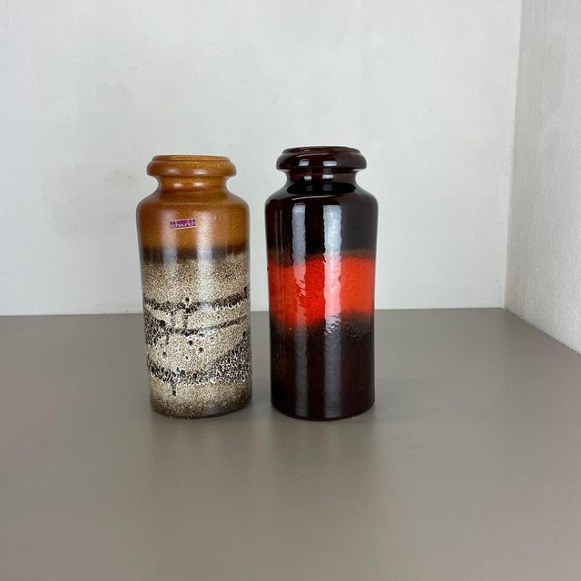These original vintage vases was produced in the 1970s in Germany. It is made of ceramic pottery in fat lava optic. Super...