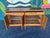 Classic mid century teak hutch with ample storage, a sturdy build, and illumination to show off all your mementos. The top...