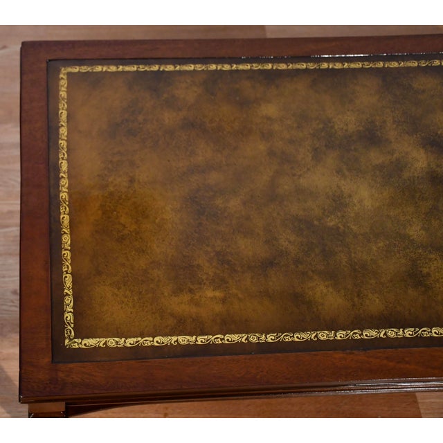 We are pleased to offer this beautiful English Regency coffee table, from the 1930s. This table is made of Mahogany wood,...