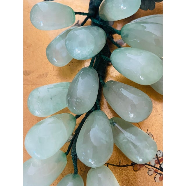Beautiful naturalistic polished pair of vintage jadeite jade grape clusters.