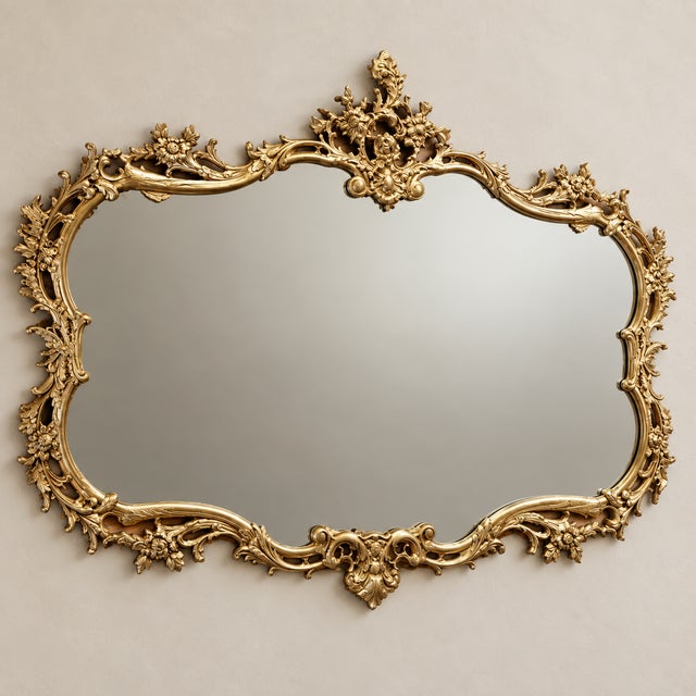 Make a statement with this elegant French Rococo-inspired wall mirror, featuring a beautifully sculpted frame with...