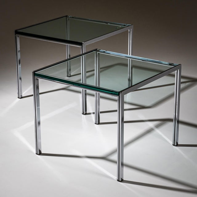 Pair of coffee tables from the “Luar” series, designed by Ross Littell for ICF de Padova in the 1960s. The tables feature...