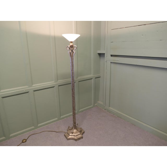 Art Deco Floor Lamp This is a beautifully designed piece, the lamp has a heavy iron frame which has a distressed silver...