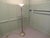 Art Deco Floor Lamp This is a beautifully designed piece, the lamp has a heavy iron frame which has a distressed silver...