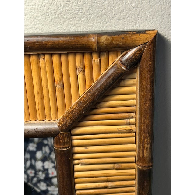 All mirror with handmade frame of bamboo and pencil reed. Total size is 24.25 x20.25. Mirror size is 15 x11.25. In very...