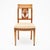 Directoire style antique French chairs made with solid wood construction that has been finished with a lustrous French...