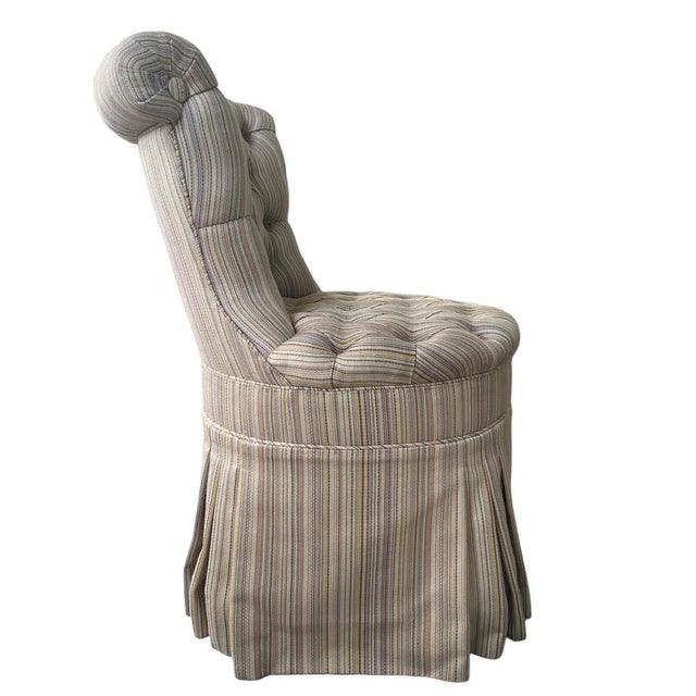 A refined swivel vanity chair from the Basilia collection by Ebanista, distinguished by its softly sculpted silhouette,...