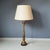 Italian, Florentine large wooden table lamp with gold paint layer. The shade is not part of this item and is for...