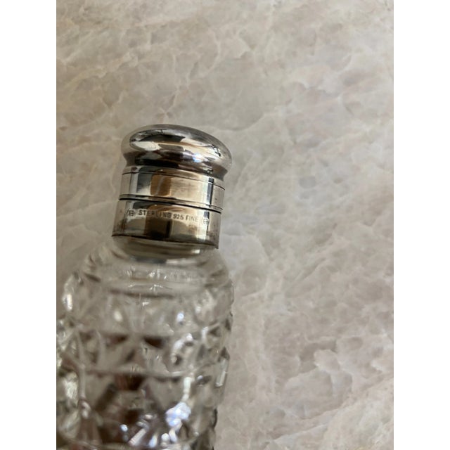 A refined example of turn‑of‑the‑century Unger Brothers craftsmanship, this c.1900 Victorian sterling silver and cut‑glass...