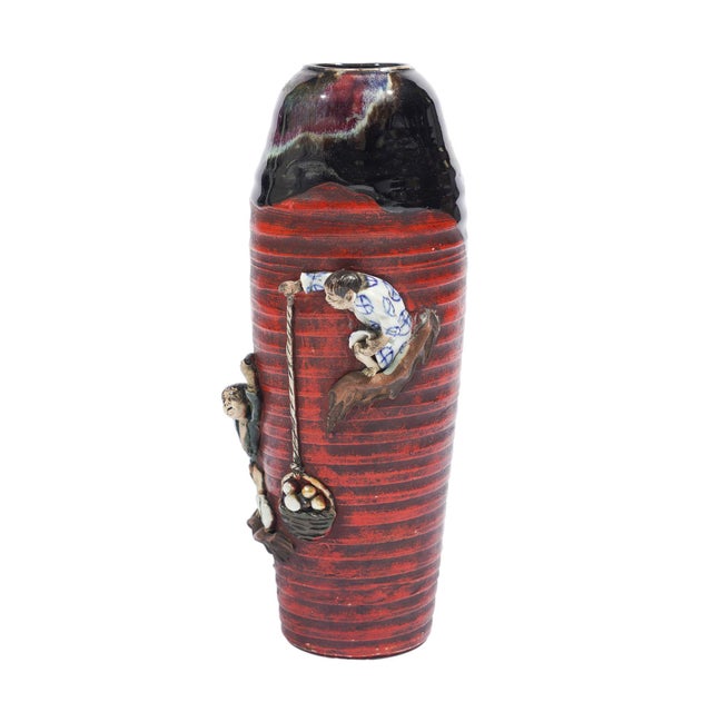 Japanese Sumida Gawa pottery vase decorated in relief with two boys gathering seashells. The pottery is named after the...
