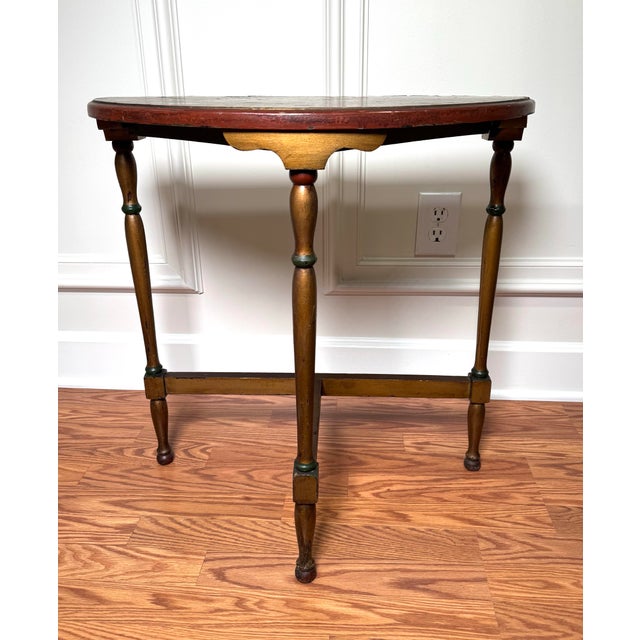 This nice sized demi-lune solid wood table exhibits the decor syles of Edwardian, American Classical to Victorian. Its'...