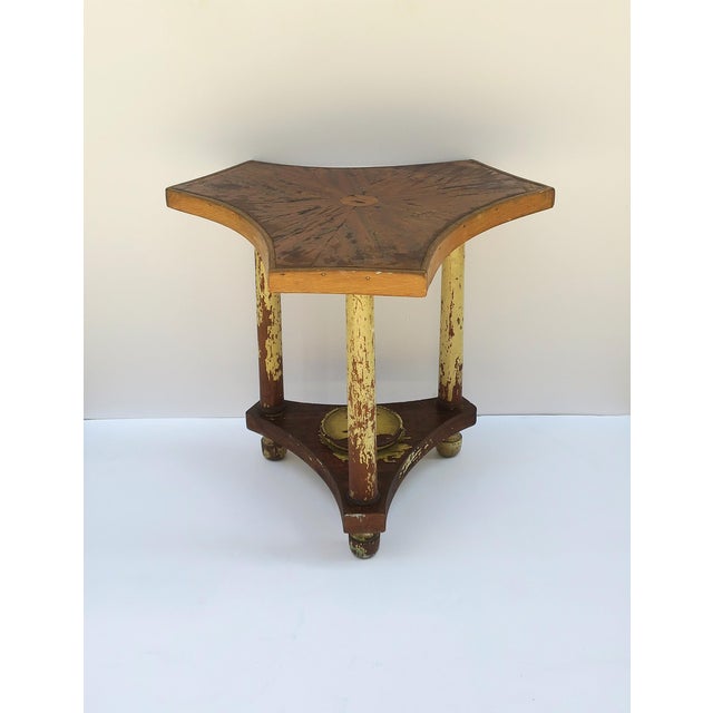 A hand‑made tripod side or ed table with an organic clover‑form top and lower tier, Rustic or Folk Art tradition, likely...