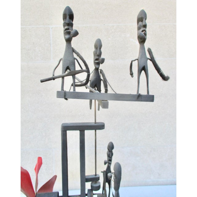 Folk art of Brazilian sculptor ADRIANO DE OLINDA. Treating the theme of the African American transit. A mobile sculpture...