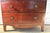 This is an antique handcrafted English mahogany bowfront Chest drawers. This English chest was constructed with flame...