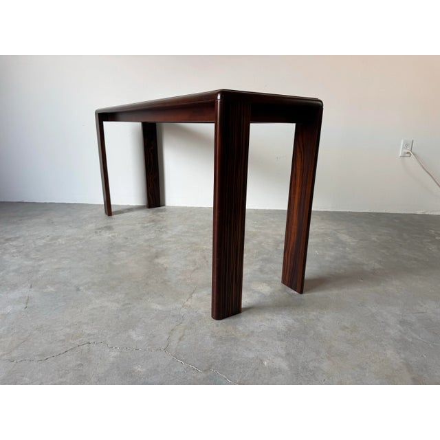 Sophisticated and timeless, this vintage console table by Baker Furniture showcases exquisite craftsmanship in rich...