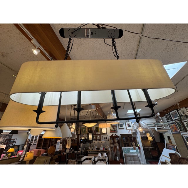Design Plus Gallery presents the Beatty Chandelier from Arteriors Home. This linear chandelier has an elongated rounded...