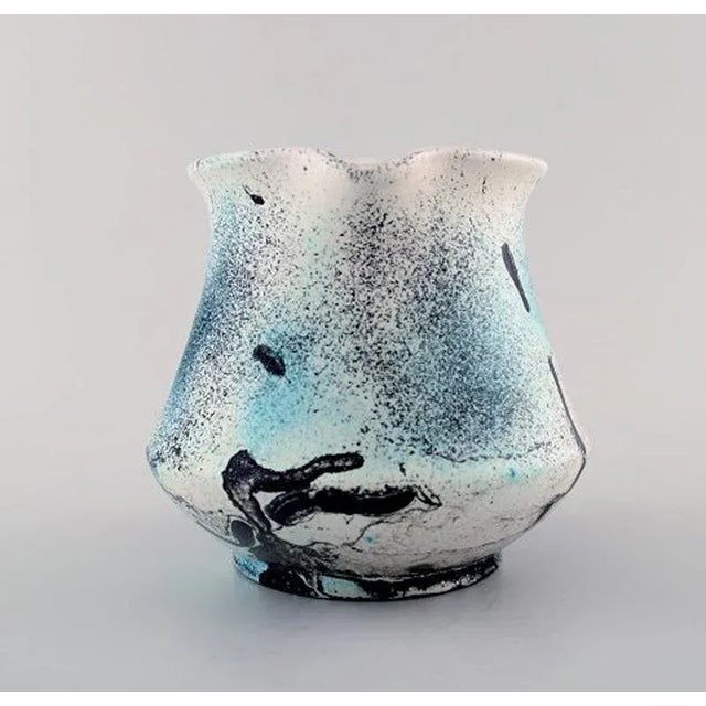 Jens Thirslund (1892-1942) Kähler pitcher decorated with greenish glaze. Stamped HAK for Herman A. Kähler, Denmark, 1930s....