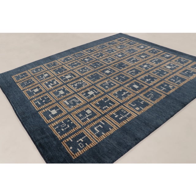 This 8x10 contemporary Art Deco geometric rug, hand-knotted in wool, draws inspiration from Jules Leleu with a structured...