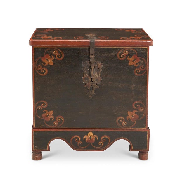 Elegant hand-painted wood chest with wrought iron clasp.