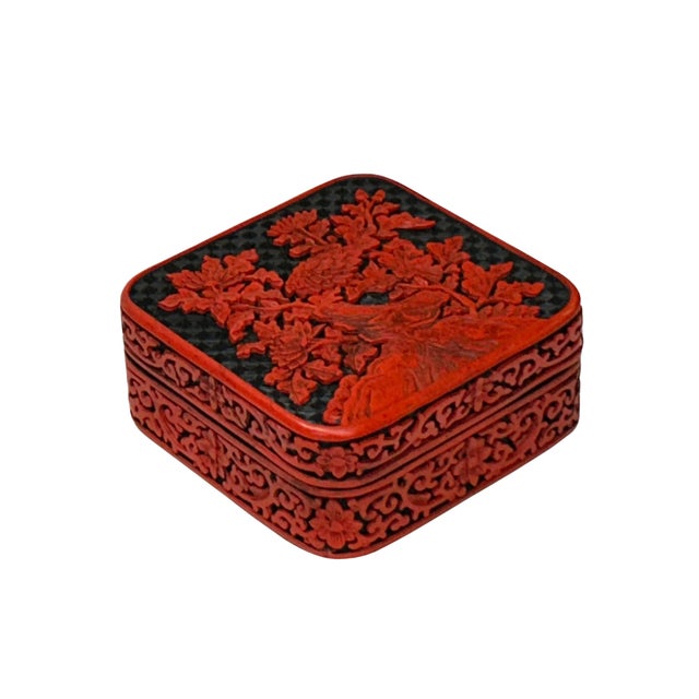 This Chinese Vintage Cinnabar Lacquer Box is a testament to exquisite craftsmanship. The rich, vibrant red lacquer creates...