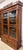 19th century American Victorian hand-carved solid walnut bookcase, circa 1890, featuring burl walnut on the columns,...