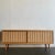 W72.25 D16 H28 Beautiful solid white oak and white oak veneer, doors feature oak accents with a cane mesh backdrop....
