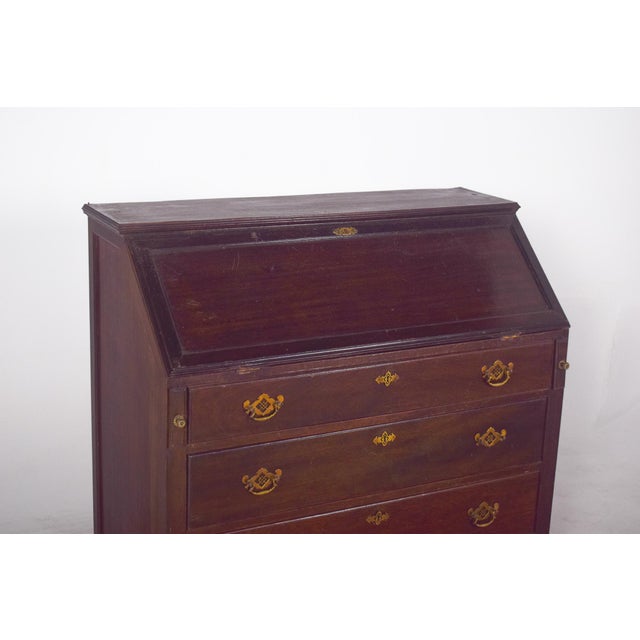 Paper chest with four drawers. The sloping top opens to reveal the internal space originally intended for writing and...