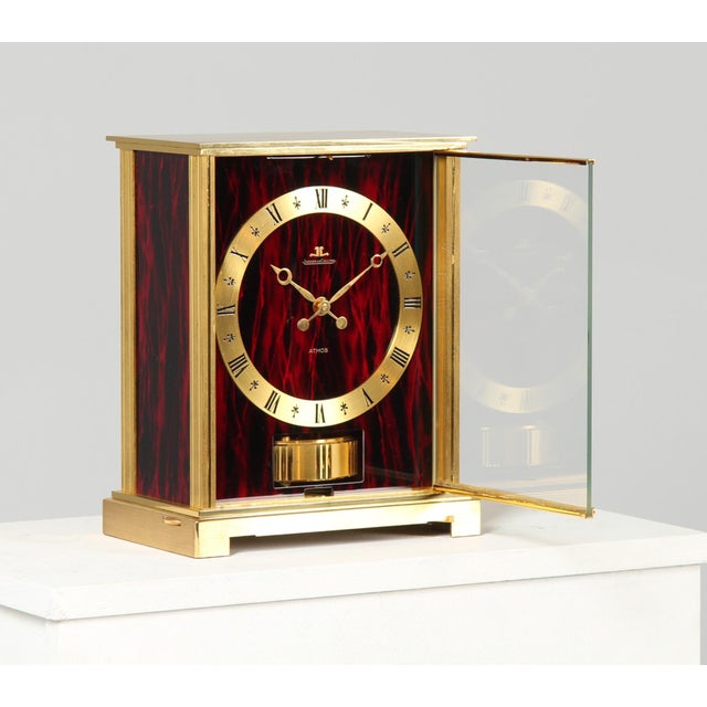 Jaeger-lecoultre – atmos clock - red flamed switzerland gold-plated brass year of manufacture: 1977 dimensions: h x w x d:...