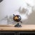 Add a bold, worldly statement to your decor with this globe accent, featuring a striking black finish with rich gold-toned...