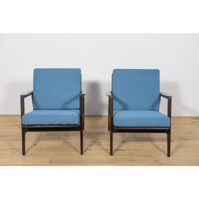 This pair of armchairs Model 300-139 was produced by the Polish company Swarzędzka Furniture Factory in 60s.The armchairs...