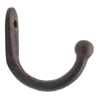 Vintage Single Arm Black Cast Iron Wall Hook For Sale