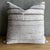 Creamy white hemp rug pillow with stripes. Soft hand, linen blend backing with zipper closure. Spot cleaning is...