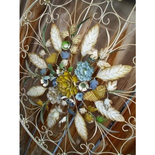 Beautiful vintage handpainted wrought iron floral wall hanging, reminiscent of the Hollywood Regency and Italian toleware...
