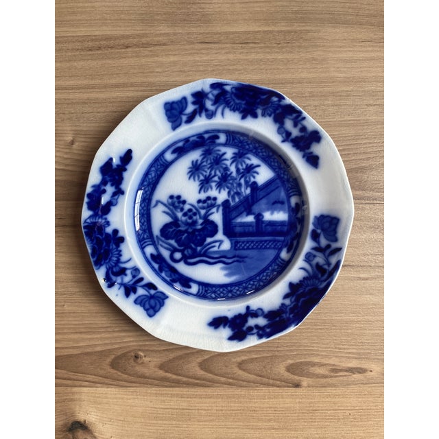 Beautiful pair of antique blue flow plates designed by Samuel Alcock in the 1800s. In excellent condition for age.