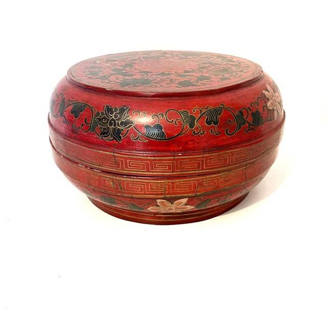A striking, large-scale antique lacquerware lidded box traditionally used as a wedding presentation. Crafted over a wood...