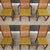A set of six mid century modern solid walnut dining chairs with cane rounded backs designed by Milo Baughman for...