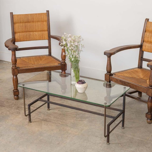Vintage iron and glass coffee table from France, 1940s. Beautiful iron frame with 4 legs and curved detail. Original glass...