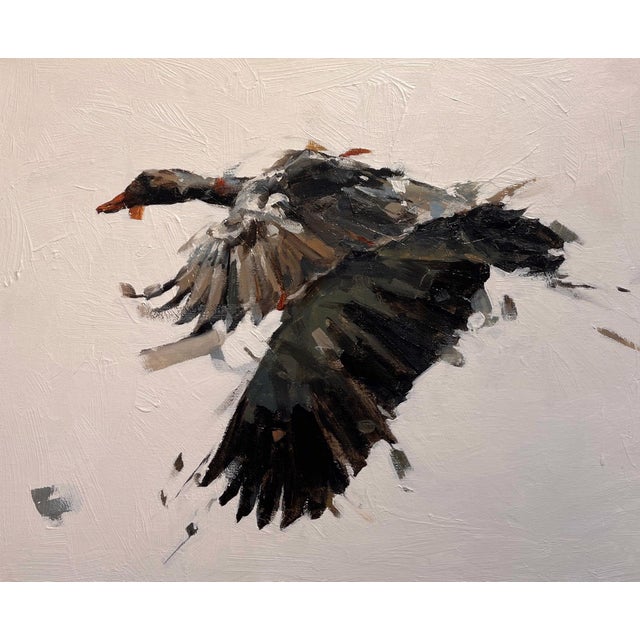 In "Goose II," a solitary goose takes flight, its wings outstretched in a dynamic display of movement. The artist employs...